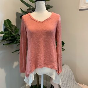 Coral sweater with layered look